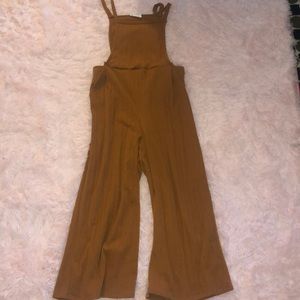 orange jumpsuit with flared pants. size medium